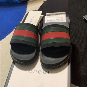 Gucci slides all terrain bottoms size 9.